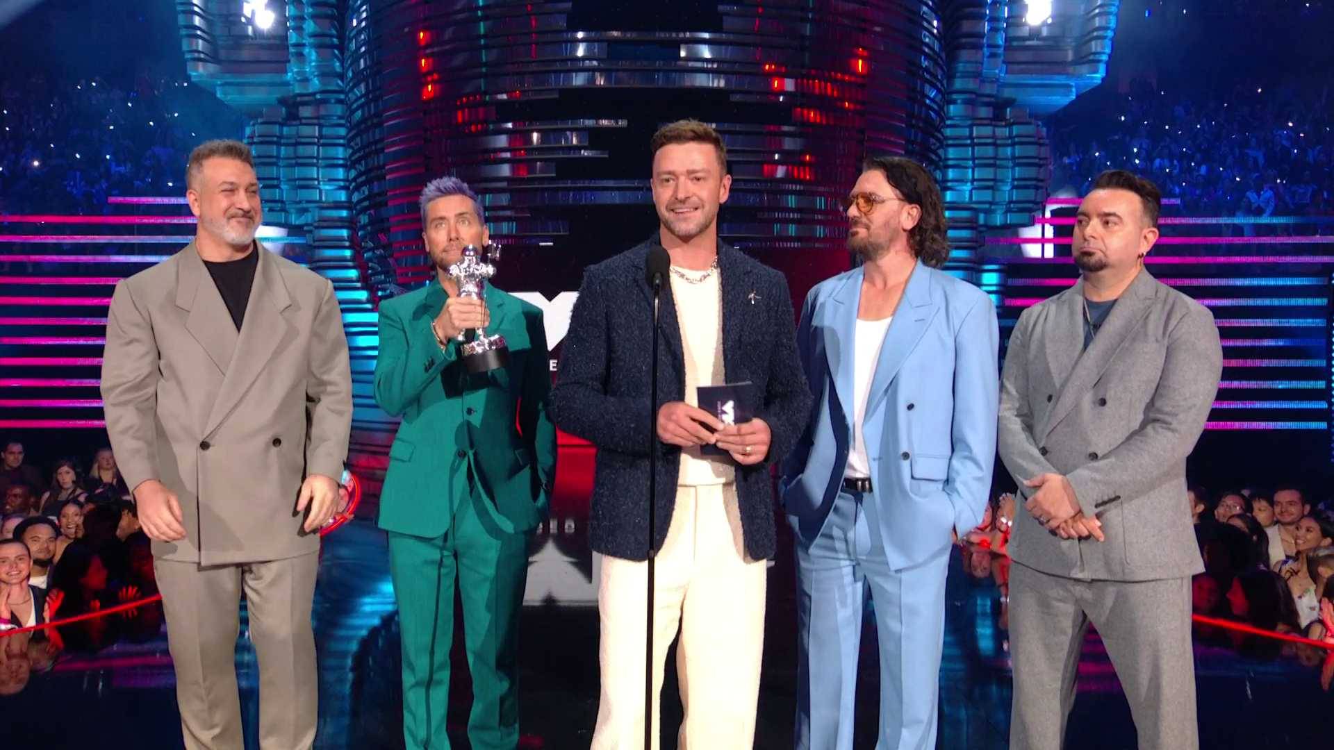 The members of *NSYNC take the MTV VMAs 2023 stage to present the award for Best Pop to Taylor Swift for her song "Anti-Hero."