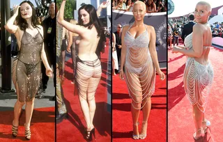 Rose McGowan donned one of the most infamous and revealing VMA red carpet outfits of all time back in 1998. Who better to recreate the look in 2014 than the always gorgeous yet scantily clad Amber Rose?