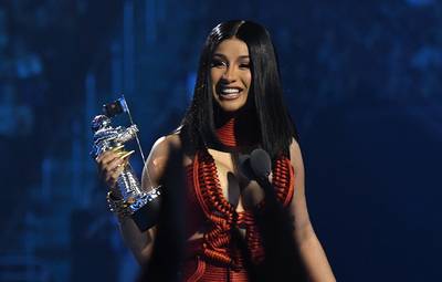 Cardi B takes the stage to accept the award for Best Hip Hop.