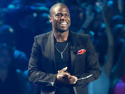 Kevin Hart's epic hosting gig of the 2012 show included a serious stage dive, dancing 'Gangnam Style' with Psy himself, and plenty of off-the-cuff jokes in between. (Getty Images)