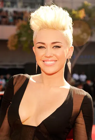 At the 2012 VMAs, Miley Cyrus rocked a platinum blonde mohawk that perfectly matched her rock and roll style.