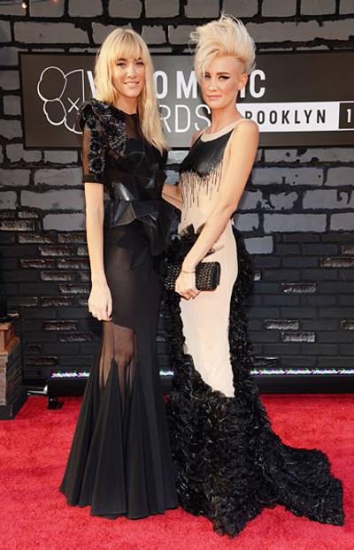 Double vision! Twin sisters Miriam and Olivia Nervo steal the show in exquisite black gowns on the 2013 VMA red carpet.