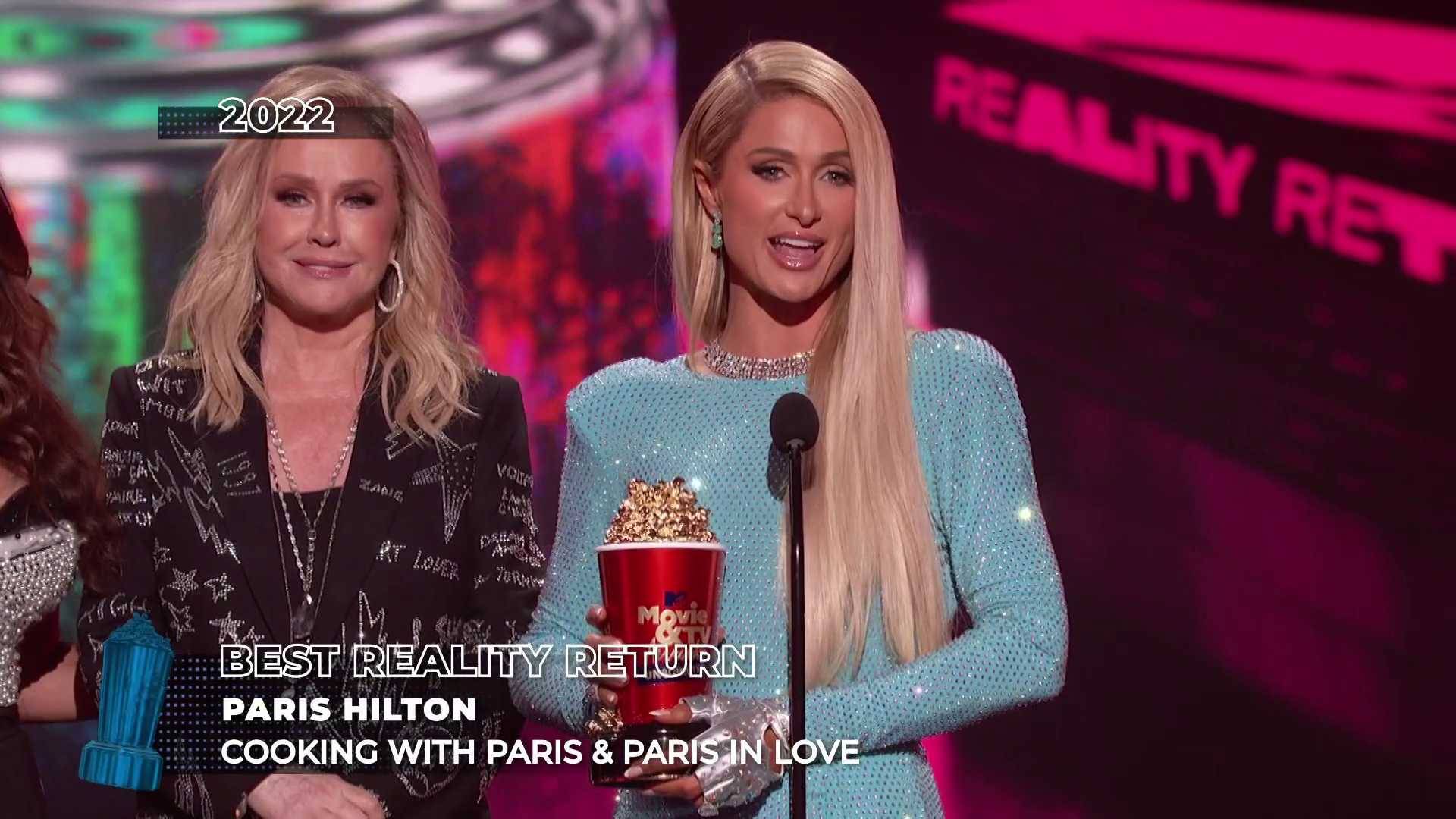 Paris Hilton accepts the award for Best Reality Return at the Movie and TV Awards 2022.