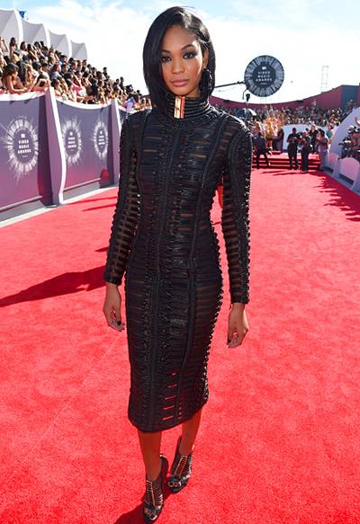 Chanel Iman is runway ready for the 2014 VMA red carpet, modelling a heavy black leather Balmain frock.