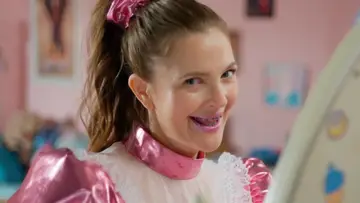 Drew Barrymore reprises her role as Josie Grossie from "Never Been Kissed" as she tries to get a kiss from some of the MTV Movie & TV Awards nominees in a pink and white dress. This image is used as the thumbnail for the MTV Movie & TV Awards 2023 full episode.