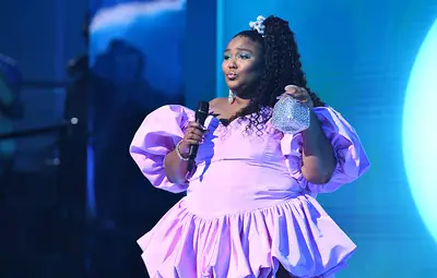 Lizzo channels her inner 80s goddess onstage.