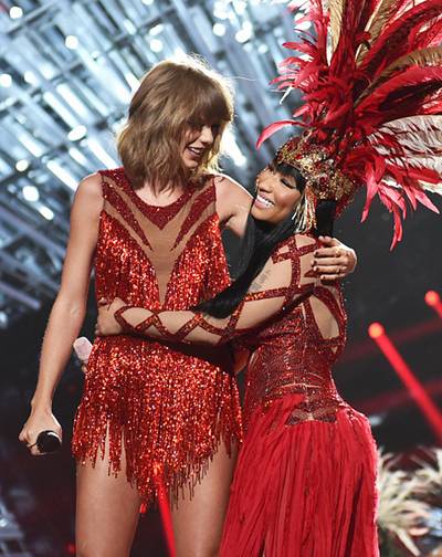 Taylor Swift and Nicki Minaj hug it out after a crowd pleasing surprise mash-up of "Trini Dem Girls" and "Bad Blood" that squashed any lingering rumors of their Twitter beef at the 2015 MTV Video Music Awards.