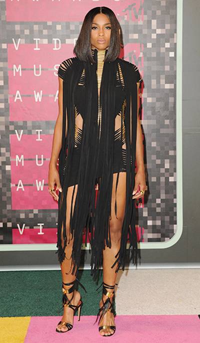 During the 2015 Video Music Awards red carpet, Ciara rocked a gorgeous black tasseled dress with matching heels. Can you say hawt?!