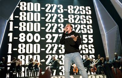 In one of the most powerful moments of the night, Logic was joined by 50 suicide attempt and loss survivors for his 2017 VMA performance of his song titled for the suicide hotline, “1-800-273-8255.”