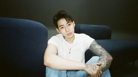 Jay Park poses in a white tee