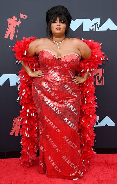 mgid:file:gsp:entertainment-assets:/mtv/events/vma/2019/images/vma19_flipbook_lizzo_600x940_082619.jpg