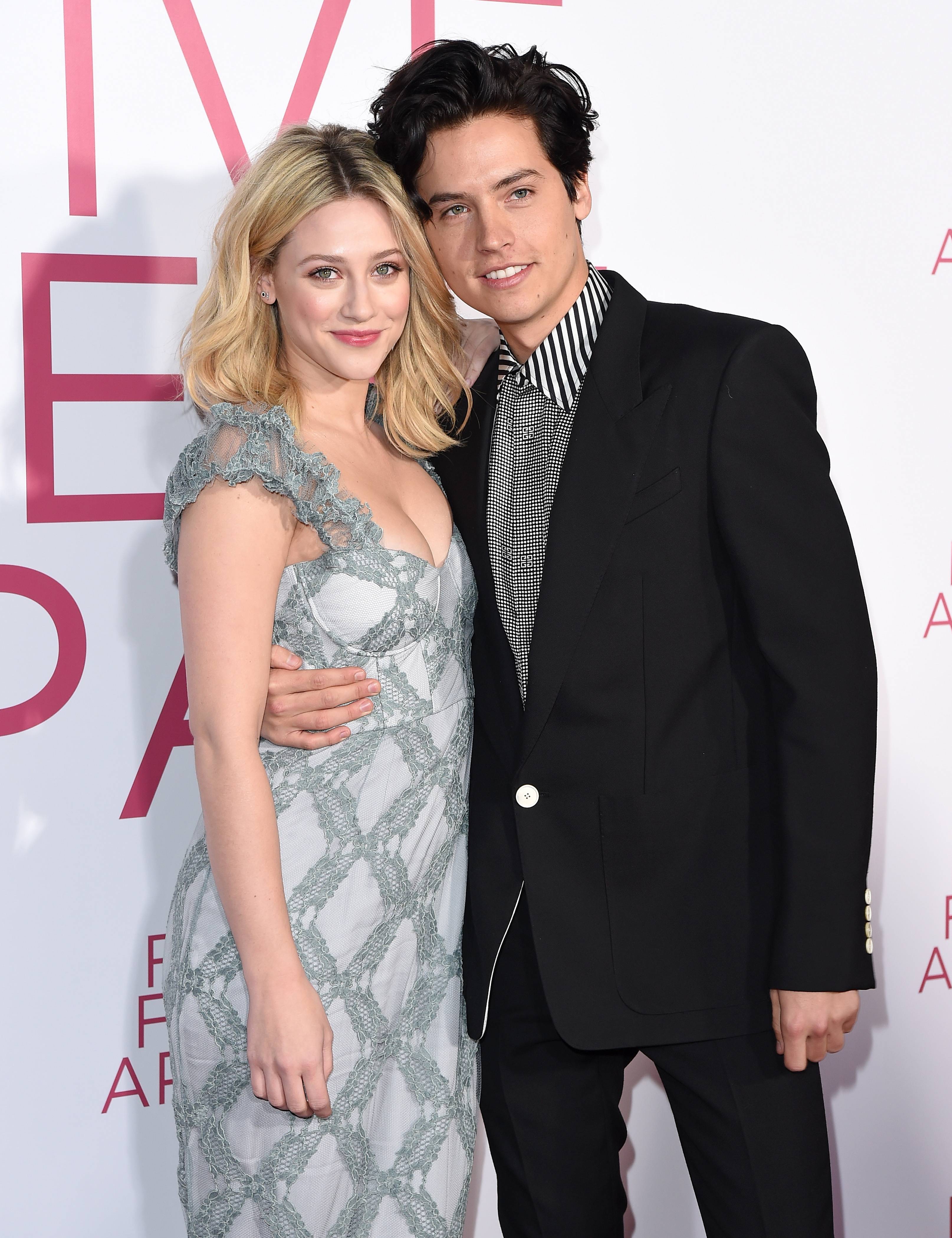 Cole Sprouse Takes A Bite Out Of Lili Reinharts Neck In Steamy New Instagram Pics News Mtv