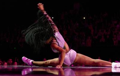 Normani does a split during her performance at the 2019 VMAs.