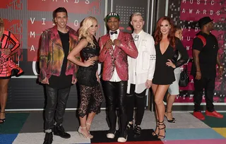 New to the MTV family, Todrick Hall goes for leather pant and colorful suit jacket combo on the 2015 VMA carpet.