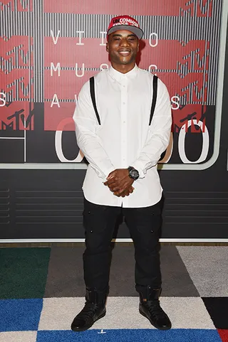'Guy Code' star Charlamagne goes for a classic black and white look on the 2015 MTV Video Music Awards red carpet.