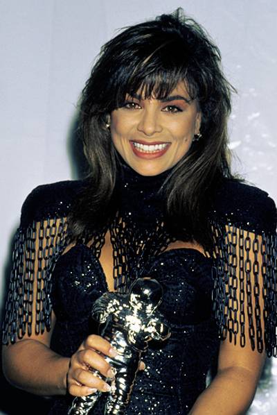 Paula Abdul proves she's as fierce as her outfit after nabbing four Moonmen at the 1989 MTV VMAs.