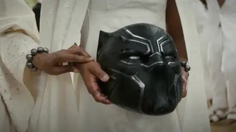 A close-up of Marvel superhero Black Panther's mask