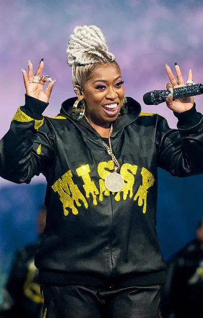 Missy Elliott is giving some serious 90s vibes in her bedazzled tracksuit.