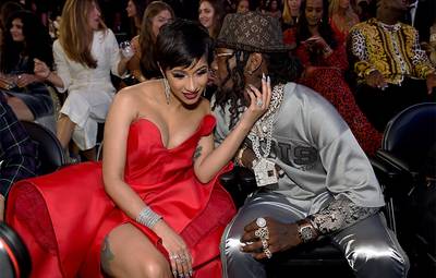 Migos member and VMA nominee Offset whispered sweet nothings into his wife, Cardi B’s ear at the 2018 Video Music Awards in New York City.