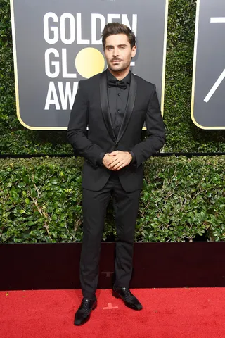mgid:file:gsp:scenic:/international/mtv.it/Fotogallery/golden-globes-2018-zac-efron-GettyImages-902348622.jpg
