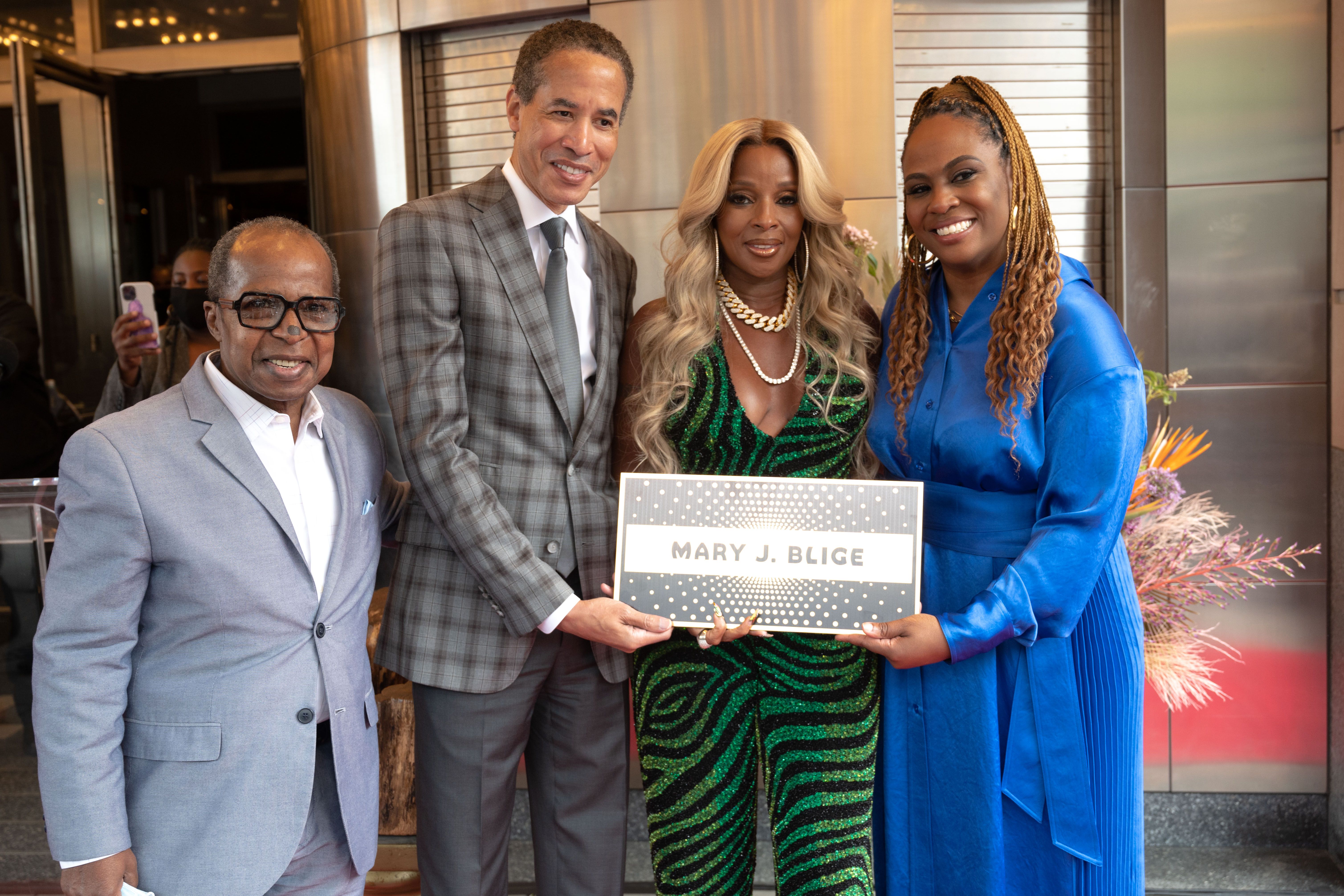 NEW YORK, NEW YORK - MAY 28: Billy Mitchell, Charles Phillips, Mary J Blige and Kamilah Forbes pose with Mary J Blige's plaque at a ceremony for induction into the Apollo Walk of Fame at The Apollo Theater on May 28, 2021 in New York City. (Photo by Shahar Azran/WireImage)