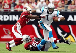 /content/dam/betcom/images/2011/09/Sports/091211-sports-nfl-cam-newton-record-debut.jpg