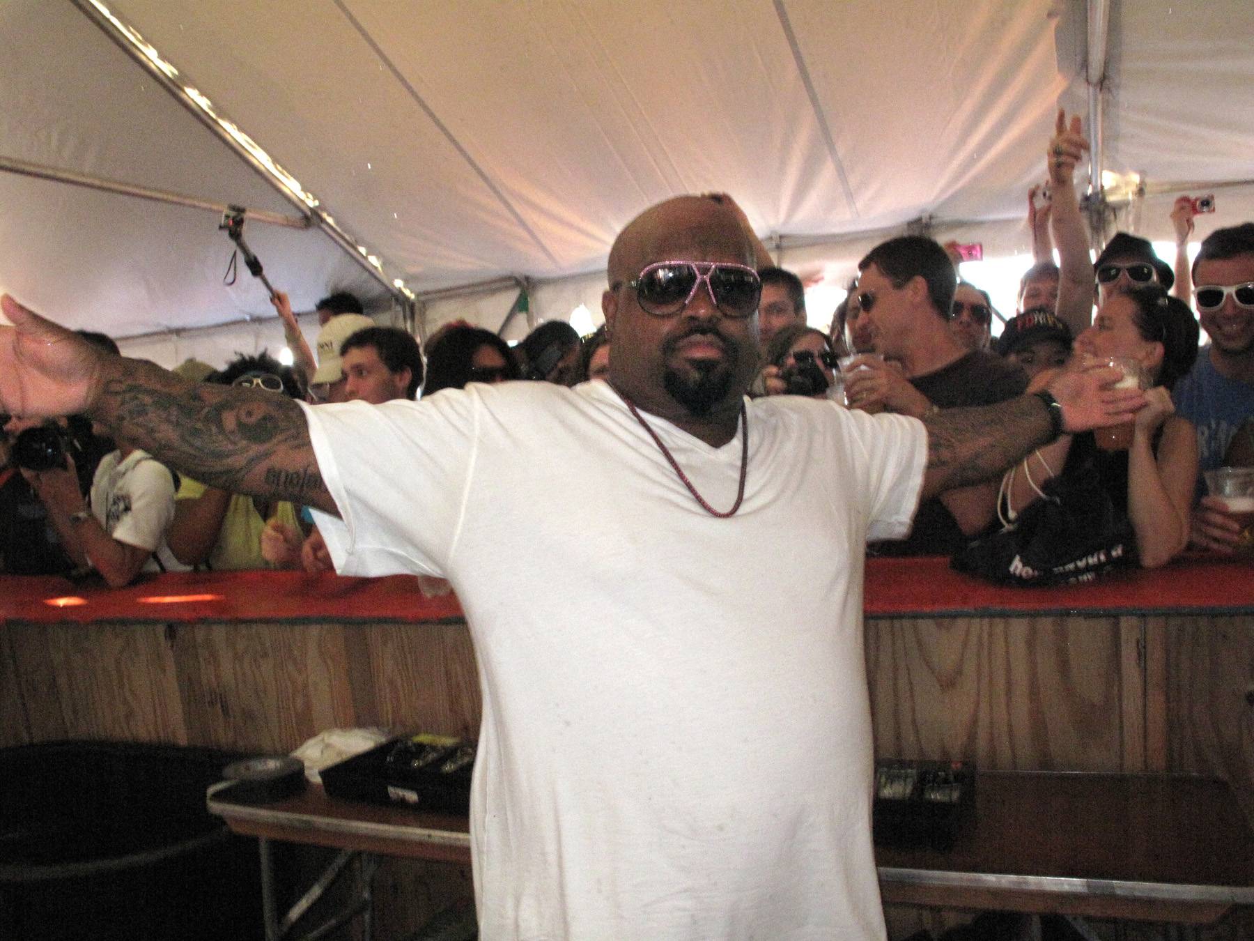 Free Drinks for All! - Cee Lo Green showed up at the bar a few minutes before his show to hand out free beers to the very excited fans. (Photo: Melissa Jean Miller/BET)