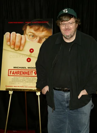 October: A Movie that Changes The World - American filmmaker Michael Moore takes a critical look at President Bush and the &quot;War on Terror&quot; in a controversial feature film &nbsp;that becomes the highest-grossing documentary of all time: Fahrenheit 9/11.(Photo: Peter Kramer/Getty Images)