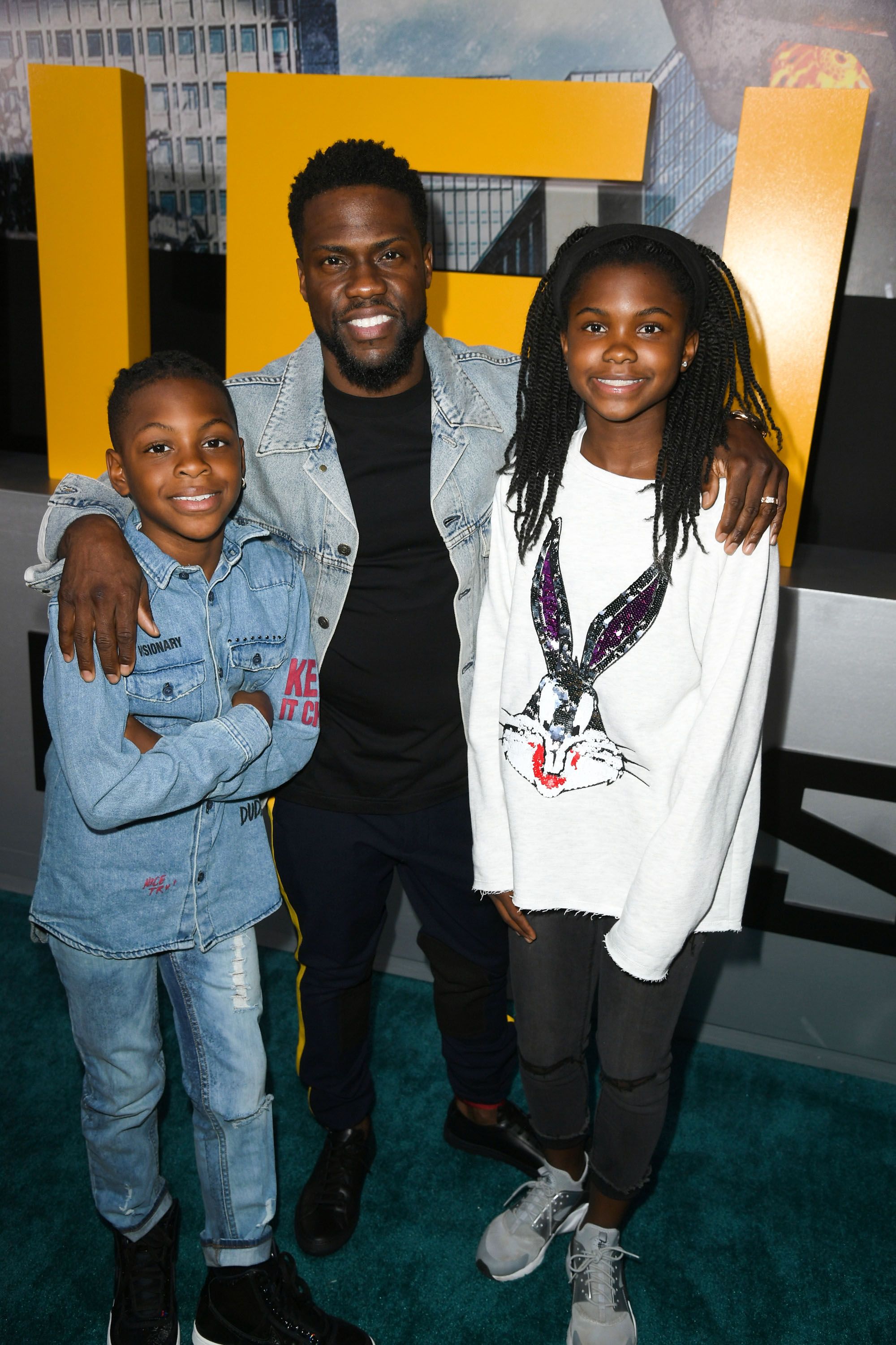 HOLLYWOOD, CA - MARCH 21:  Hendrix Hart, Kevin Hart and Heaven Hart attend Universal's "Pacific Rim Uprising" premiere  at TCL Chinese Theatre IMAX on March 21, 2018 in Hollywood, California.  (Photo by Kevin Winter/Getty Images)