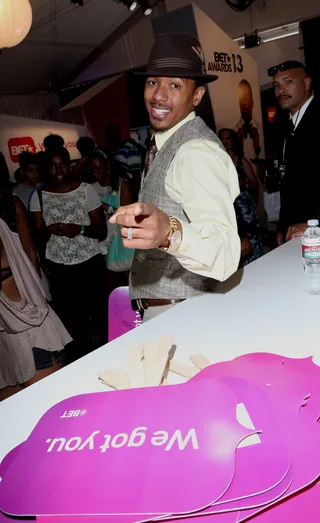 Nick Cannon in the BET Pavilion  - Nick Cannon stopped through the BET Pavilion during Fan Fest. The star enjoyed the ambience and hot DJ. (Photo: James W. Lemke/Getty Images for BET)