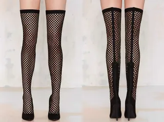 The Sexy Shoe:&nbsp;Nasty Gal In The Cage Thigh-High Boot&nbsp;($158) - You won't be able to keep his hands off you in these fishnet-like boots. Pair them with a mini shift dress or just some goodies from the lingerie department.(Photo: Nasty Gal)