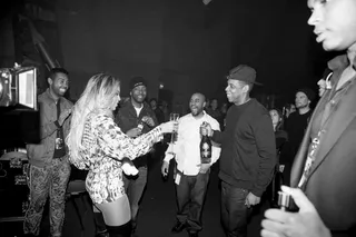 Cheers - The couple celebrated the end of Bey’s year-long Mrs. Carter Show World Tour with a cold bottle of champagne and megawatt grins.  (Photo: iam.beyonce via Tumblr)