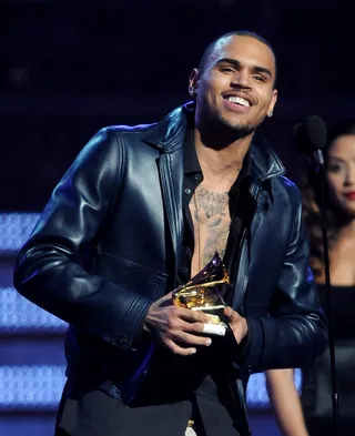 Chris Brown - Chris Brown’s Grammy return was topped off with a big win as his platinum-selling LP F.A.M.E. won Best R&amp;B Album. A humbled Brown could barely find the words to express his gratitude.&nbsp;(Photo: Frank Micelotta/PictureGroup)