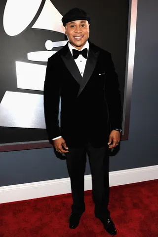 LL Cool J - Host with the most LL looked like he was ready to greet his guests with a glass of scotch in this black smoking jacket with a newsboy cap accent. And who would turn that down? (Photo: Larry Busacca/Getty Images)