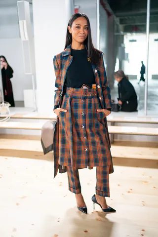 Zoe Saldana - Zoe Saldana attends the Tory Burch Fall Winter 2019 Fashion Show at Pier 17. (Photo: Michael Stewart/WireImage)&nbsp;Alt Text: