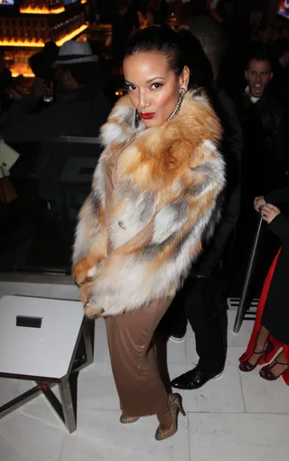 Selita Ebanks  - The gorgeous model (who arrived with Terrance J and stayed by his side all night) rocked the club in a taupe gown and color-coordinating fur with drop earrings and red lips.  (Photo: Johnny Nunez/WireImage)