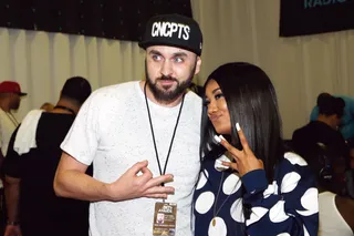 Chuck the Deuces  - Radio personality Mr. Peter Parker and singer Mila J take a cute flick. (Photo: Rich Polk/BET/Getty Images for BET)