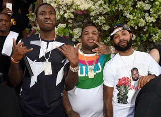 They Rollin' - Mill's frequent collaborator DJ Mustard and a friend turn up to celebrate the rapper's upcoming album Dreams Worth More Than Money.  (Photo: Jason Merritt/Getty Images for Tidal/Roc Nation)