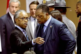 United Against Hate - Civil rights leaders Rev. Al Sharpton and Jesse Jackson talk before the beginning of Sen. Clementa Pinckney's&nbsp;funeral service.&nbsp;(Photo: Brian Synder/Landov)