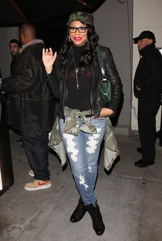 Hello, My Darlings - Tamar Braxton strikes a pose and gives a wave to the paps as she leaves Craig's restaurant after having dinner with husband Vincent Herbert in West Hollywood.&nbsp;(Photo: Devone Byrd, PacificCoastNews)