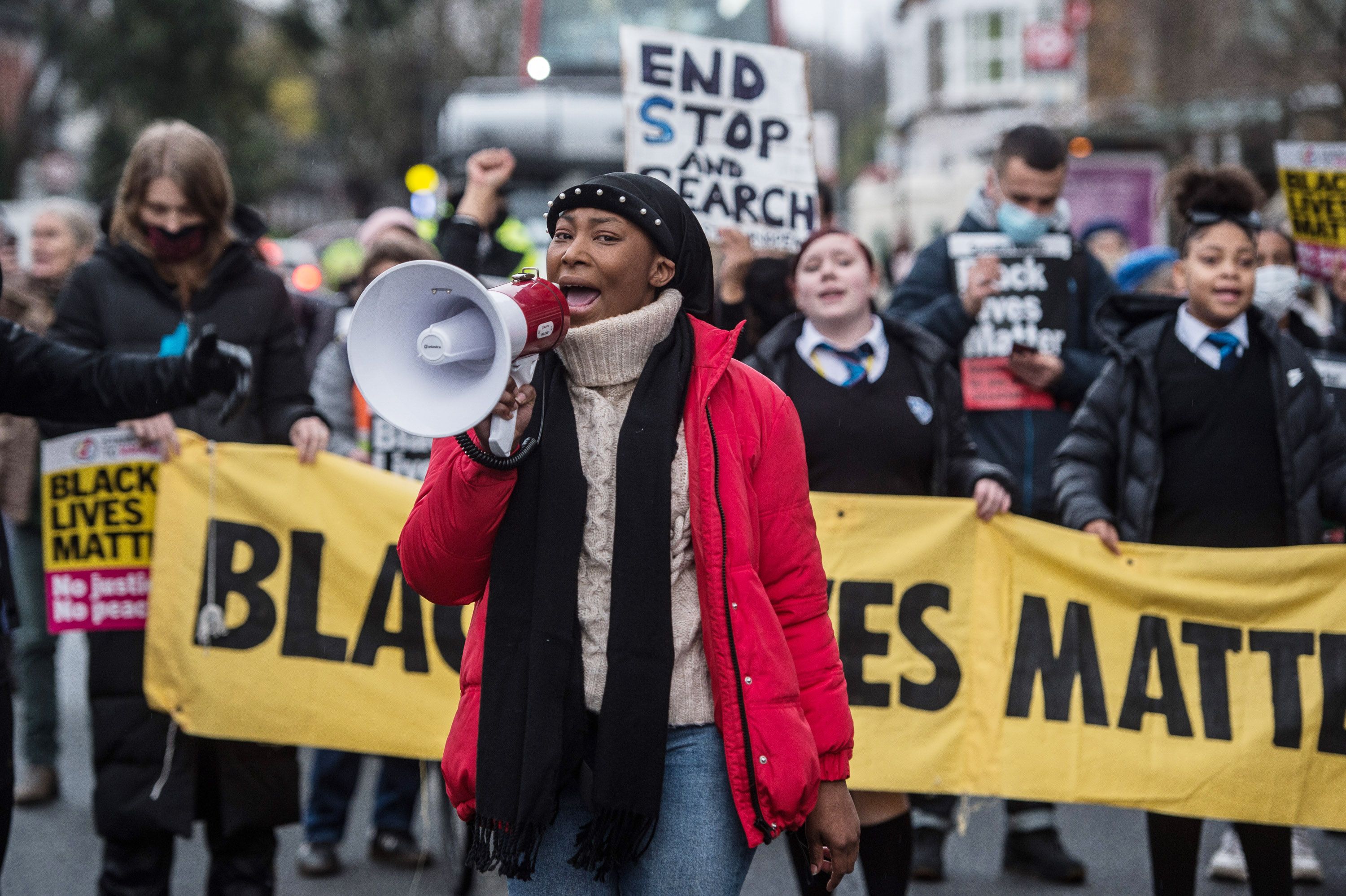 LONDON, ENGLAND - DECEMBER 11:  Black Lives Matter activist Sasha Johnson joins anti-racists, community activists and school children at a protest against police violence as they march from Park View School to Tottenham Police Station, after a video of a policeman appearing to strike a black teenager in the head outside the school went viral on twitter, on December 11, 2020 in London, England. (Photo by Guy Smallman/Getty Images)