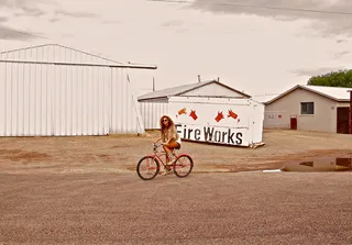 Rollin' - Beyoncé forgoes the fancy wheels for a bike ride down the road instead. And she still looks good doing it.&nbsp; (Photo: Courtesy of Iambeyonce Tumblr)