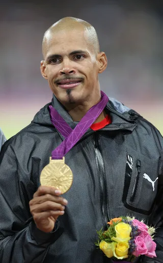 Oldest Person to Win the 400m Hurdles - Athlete: Felix Sanchez (34 years old) Country: Dominican Republic Date: Aug. 6  (Photo: Clive Brunskill/Getty Images)