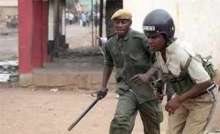 Chinese Zambian Mine Boss Killed During Wage Riot - Zambian miners angry that their wages were below the country’s new minimum wage killed a Chinese manager by pushing a mine cart at him during a riot. Several other people were injured in the riot.(Photo: BBC News)