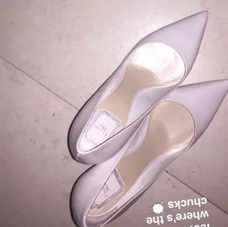 Ariana Grande @arianagrande - The pint-sized songstress loves her all-white Louboutin pumps so much she wears them at almost every show.(Photo: Ariana Grande via Instagram)