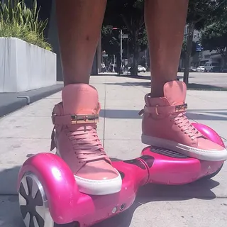 Karen Civil @karencivil - "When you want to wear your @jonbuscemi sneakers..But don't want to get them dirty. Pink on Pink"The music mogul goes the distance to make sure these pink beauties don't get dirty. #Dedication(Photo: Karen Civil via Instagram)