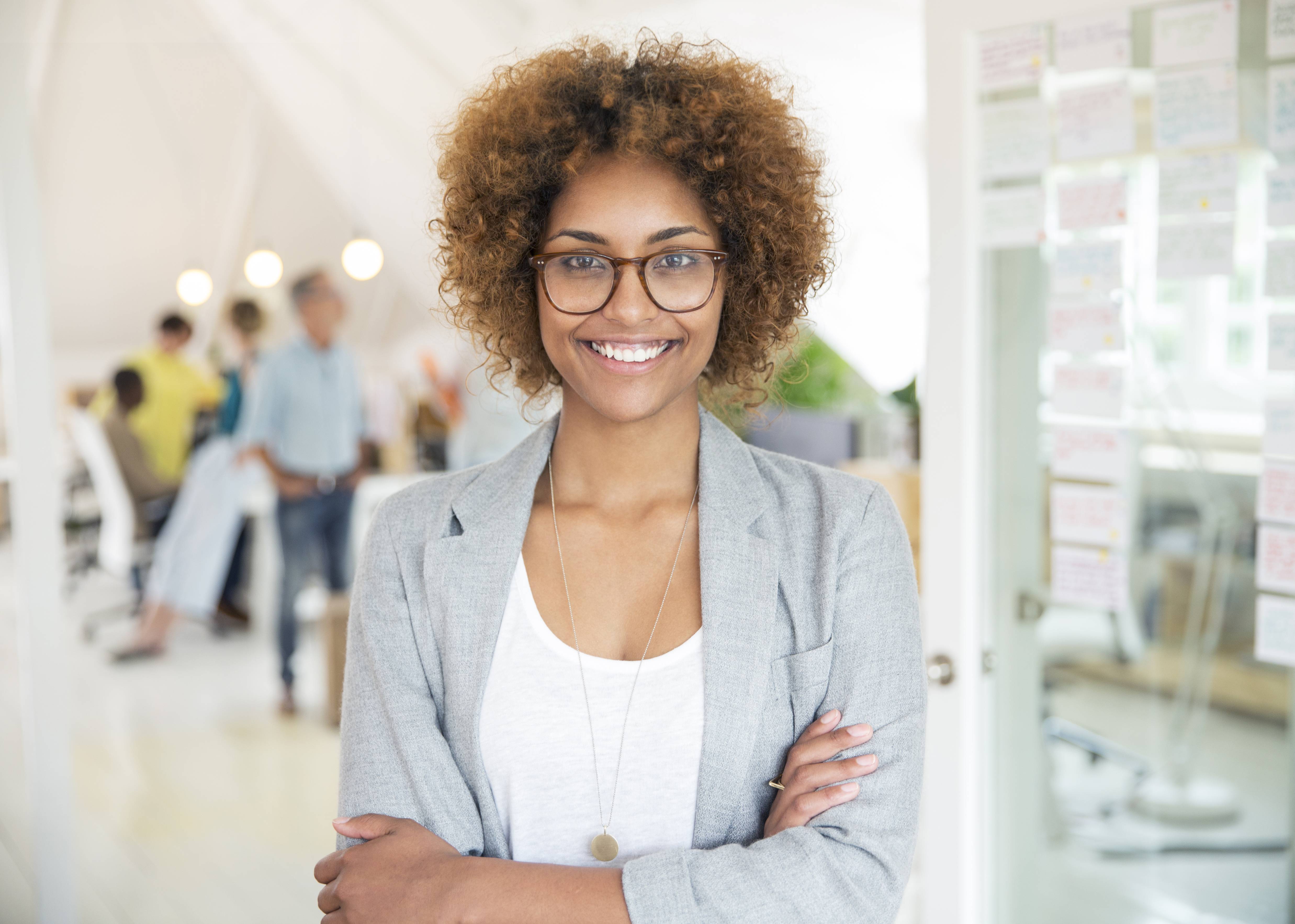 Confident young lady in interview clothes.