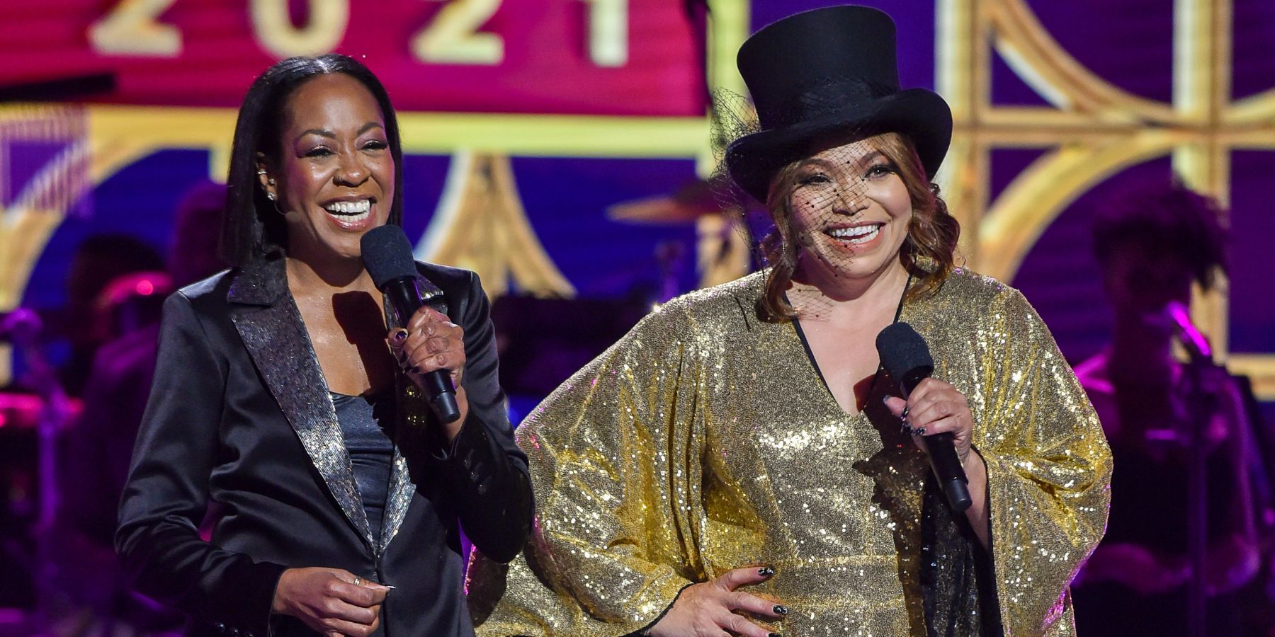 Tichina Arnold (l) and Tisha Campbell (r) perform onstage during the 2021 Soul Train Awards presented by BET at The Apollo Theater on November 20, 2021 in New York City. 