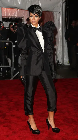 Rihanna - Rih Rih decided to serve some androgynous realness at the 2009 Met Gala by stepping out in an edgy Dolce &amp; Gabbana tuxedo.   (Photo: Stephen Lovekin/Getty Images)