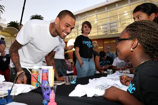 Symphonic Love Foundation Charity - Brown combined his love of music and art with his passion to help less fortunate children by launching his Symphonic Love Foundation in 2012. The non-profit charity offers grants for art programs for children and promotes acts of public service. (Photo: Christopher Polk/Getty Images for Symphonic Love Foundation)